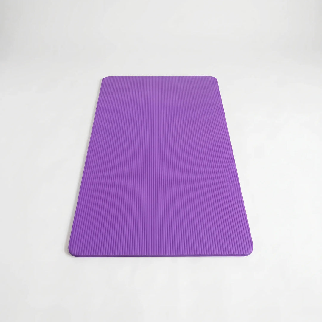 Unisex large thick pilates mat, suitable for all fitness levels. Durable stretching mat for home workouts.