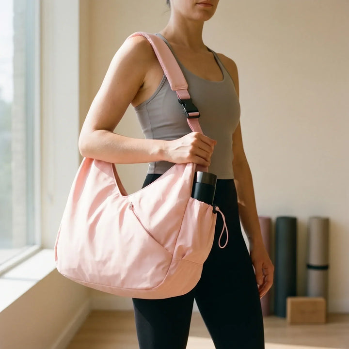 Large women's fitness tote bag with external yoga mat straps, perfect for gym, workout, or active travel.