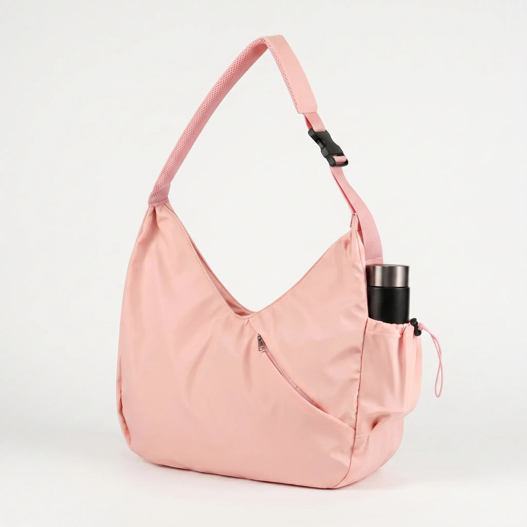 Versatile women's yoga mat bag & gym tote, spacious for workout gear with dedicated external mat straps.