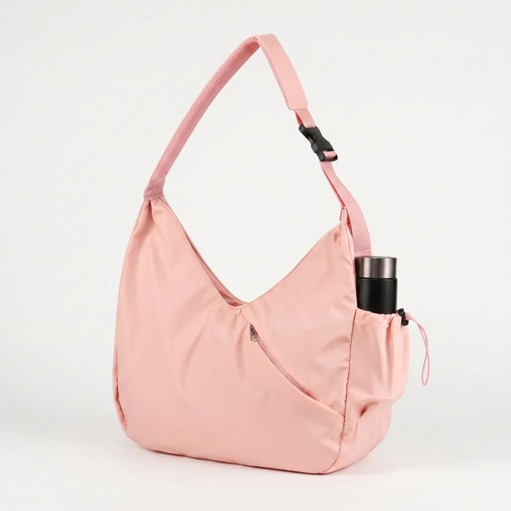 Versatile women's yoga mat bag & gym tote, spacious for workout gear with dedicated external mat straps.
