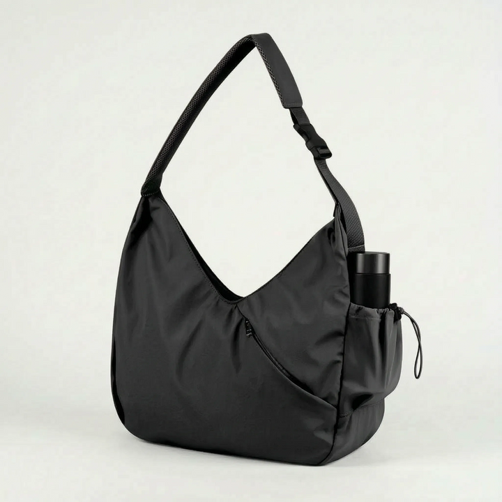 Women's large activewear tote bag with integrated yoga mat straps, perfect for fitness, gym, and daily carry.