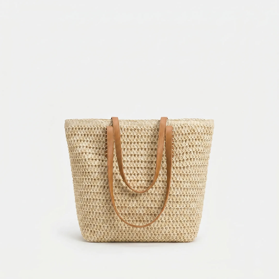 Stylish large woven shoulder tote bag for women, ideal as a beach, travel, or everyday summer carryall.