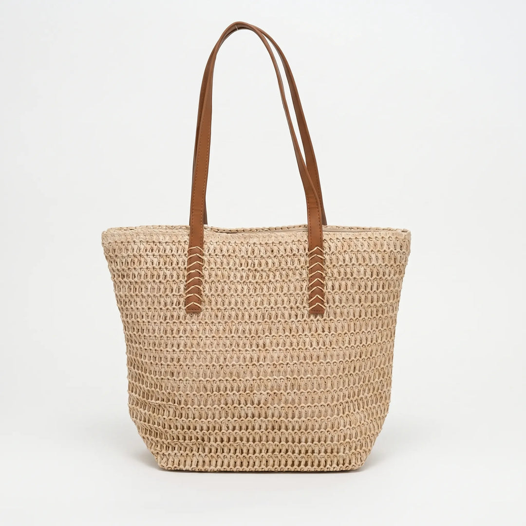 Chic large woven handbag for women, a spacious beach tote with zipper, great for summer and market trips.