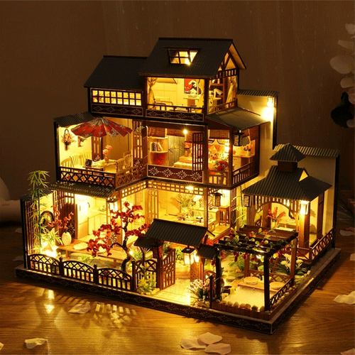DIY wooden dollhouse kit with miniature furniture & LED lights for adults & children.