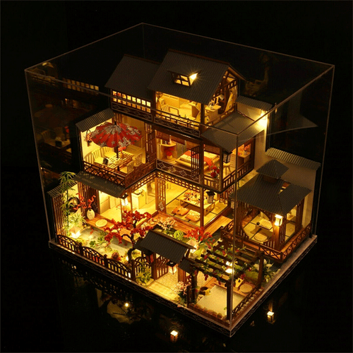 Realistic large wooden dollhouse, a detailed craft kit with working LED lights.