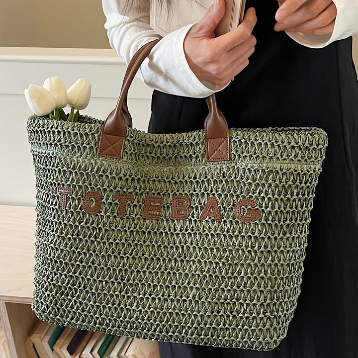 Spacious women's woven travel bag, a large tote with comfortable leather shoulder straps.