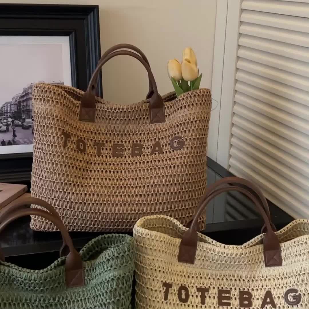 Functional large woven shoulder bag, perfect for carrying essentials with stylish leather handles.