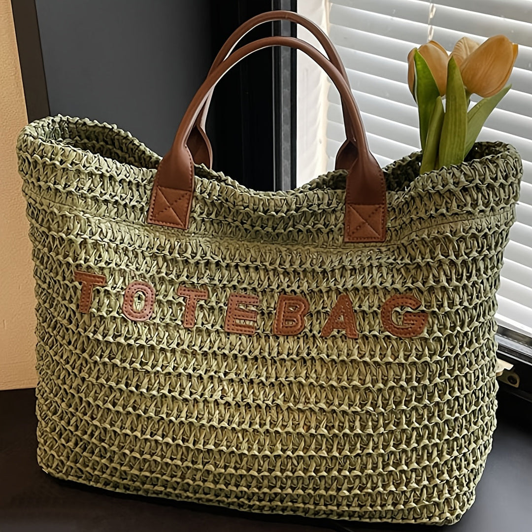 Elegant beige large woven tote bag, ideal women's accessory with durable leather handles.
