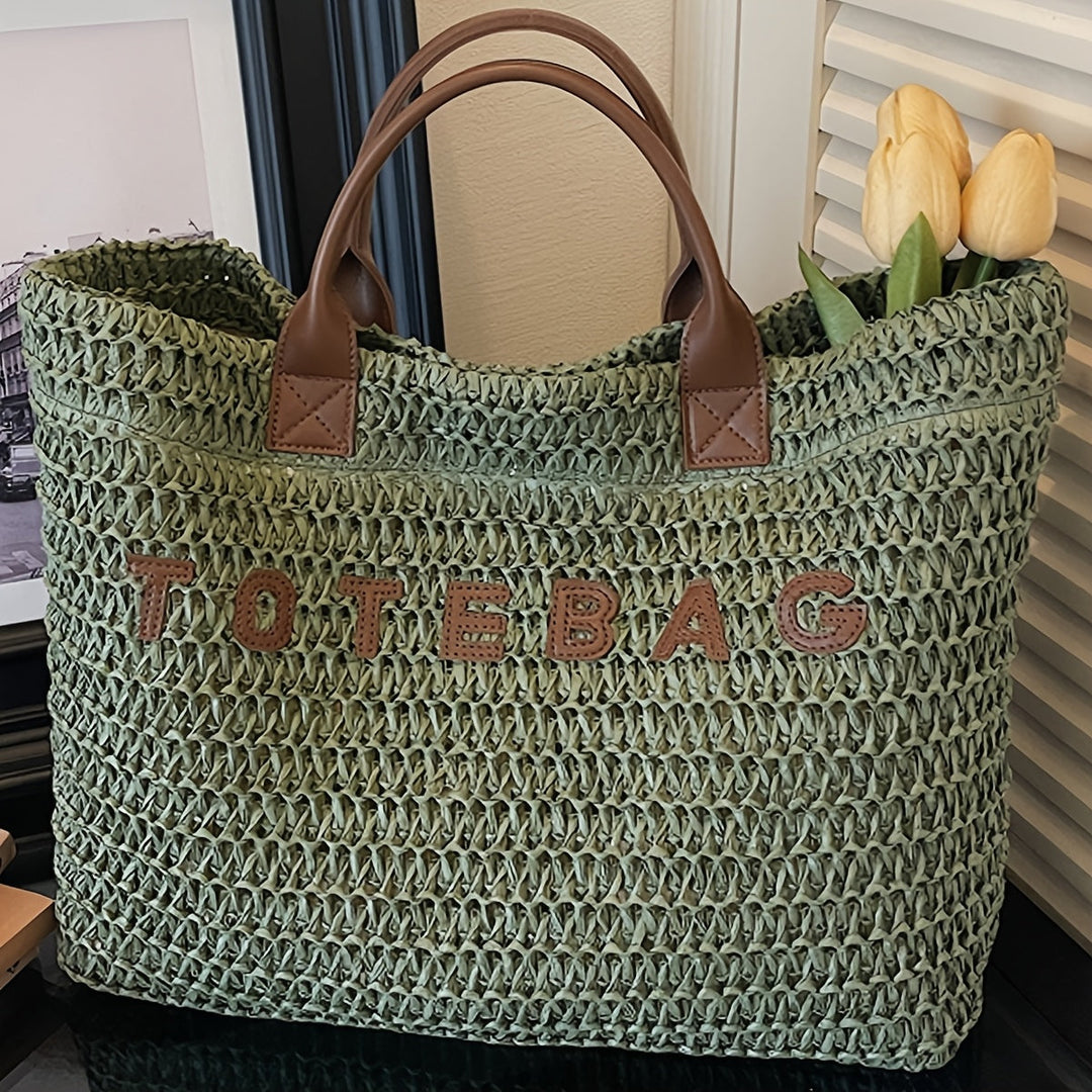 Textured green woven travel bag, a stylish shoulder bag with strong leather handles.