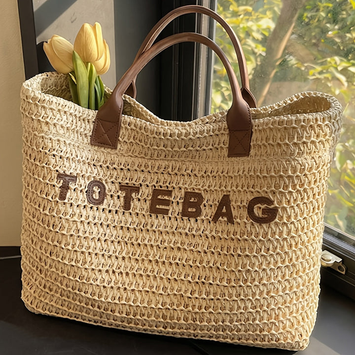 Everyday large woven tote bag featuring quality leather handles and spacious interior.