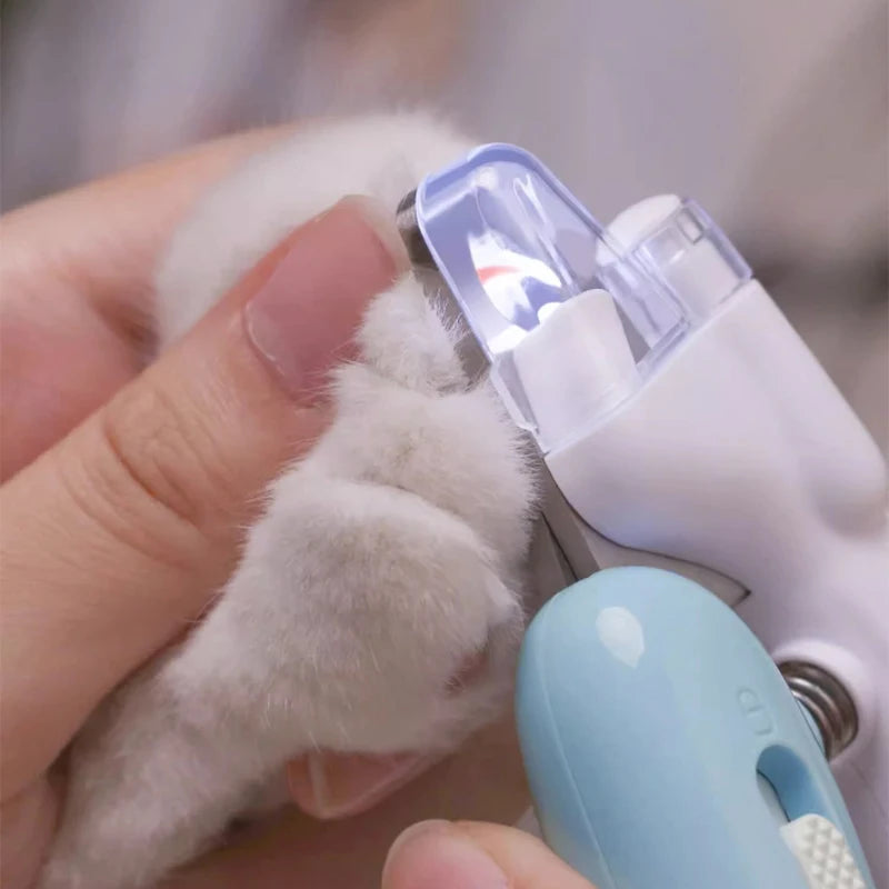 Cat nail clippers with LED light, safety guard, and sharp stainless steel blades for stress-free animal care