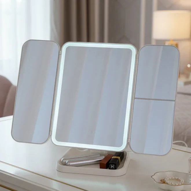 LED Tri-Fold Makeup Vanity Mirror with 3 light colors for precise cosmetic application & beauty routines.