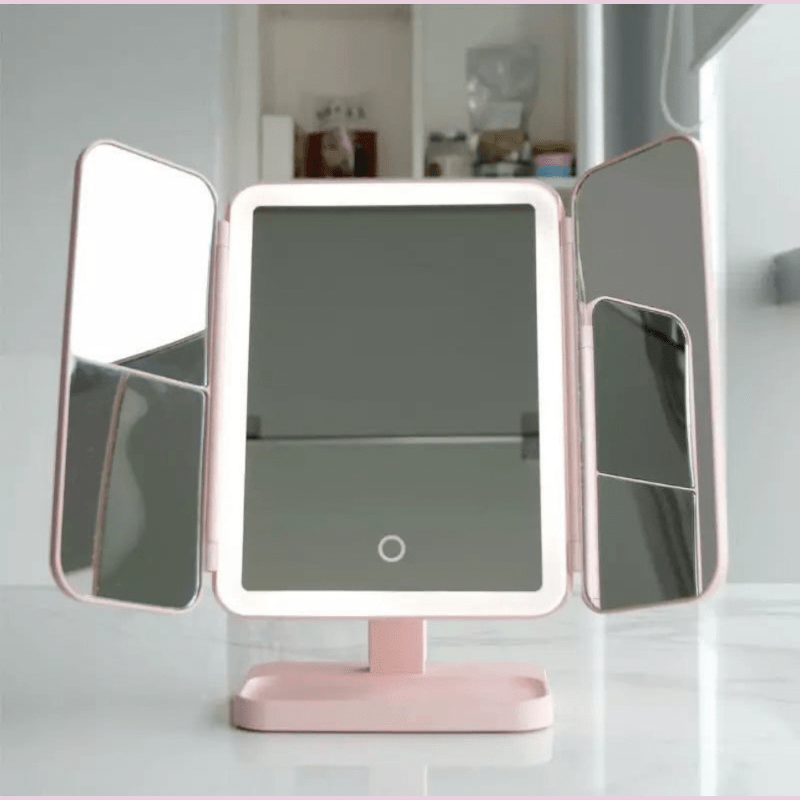 Tri-Fold LED makeup mirror with 3 adjustable light colors, perfect for different lighting conditions & makeup.