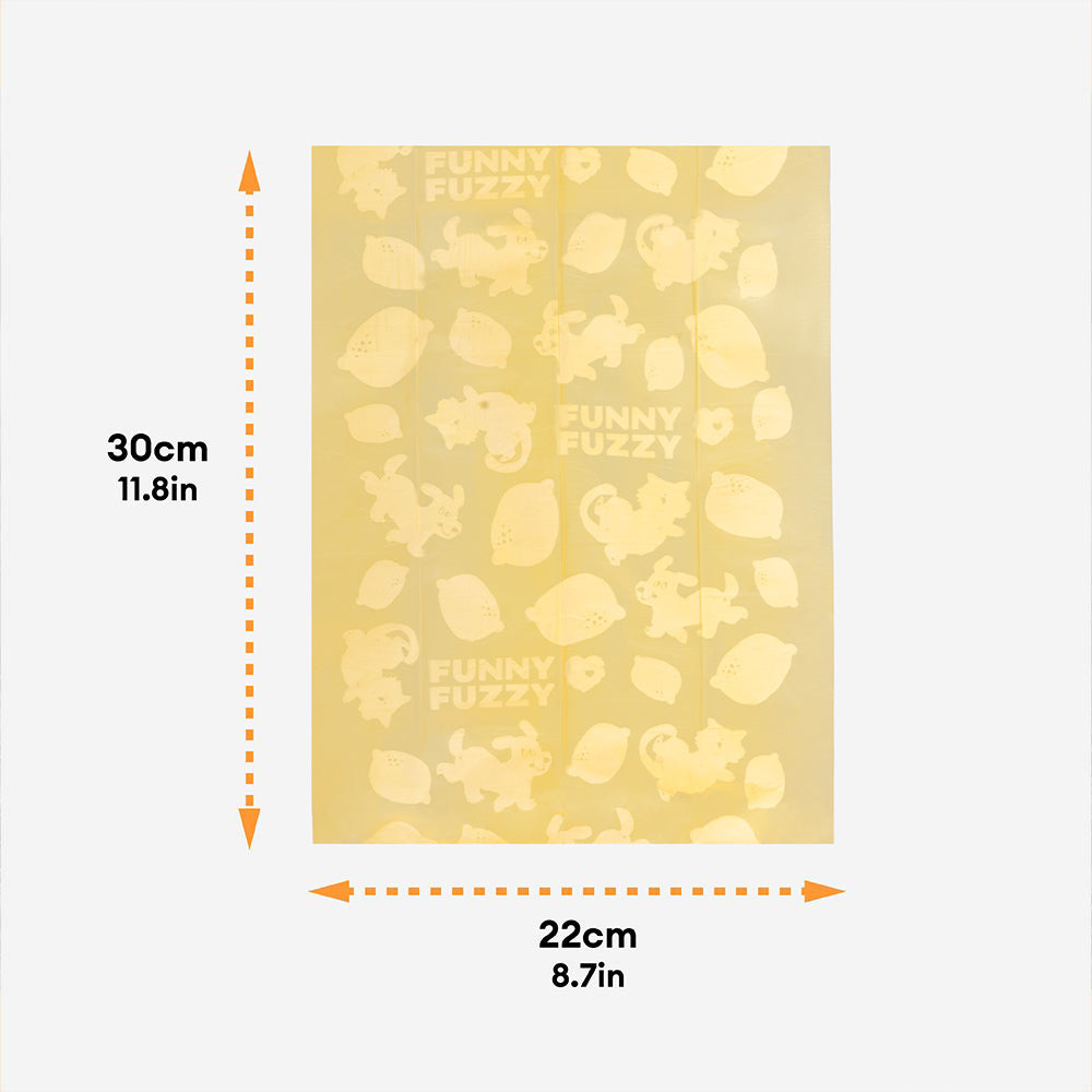 Lemon scented eco-friendly dog waste bags next to a poop bag dispenser, outdoor pet gear