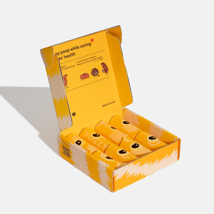 Lemon scented dog poop bags in a dispenser, ready for pet cleanup, leak-proof design