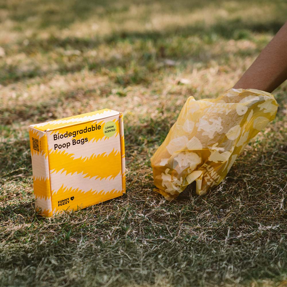 Collection of lemon scented pet waste bags, highlighting their durable, leak-proof quality