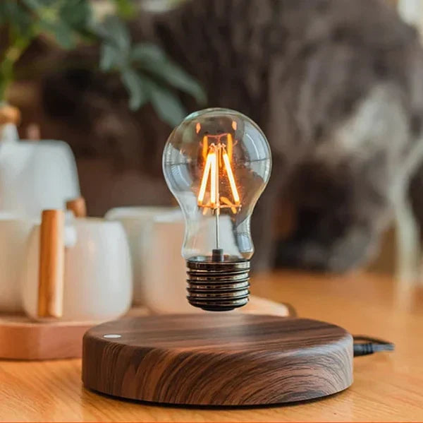 Levitating light bulb with elegant walnut wood base, a modern floating lamp for unique home decor and ambient lighting.