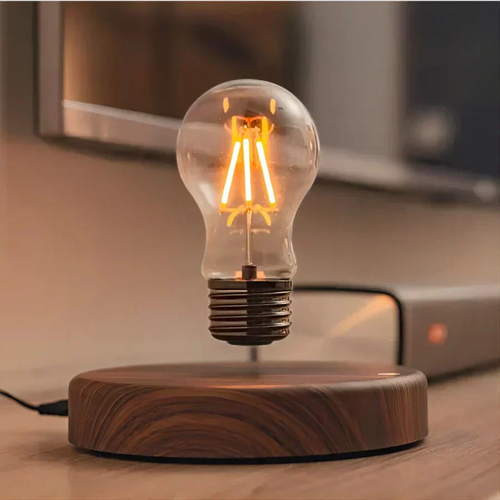 Magnetic levitating light bulb, a stylish desk lamp with a solid walnut base, perfect for modern home decor & gifts.