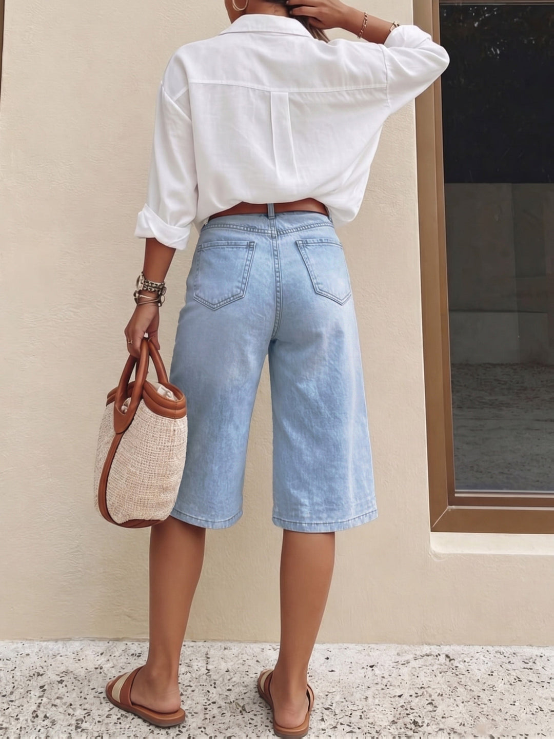 Versatile women's light blue cropped culotte shorts featuring a high waist and stylish wide leg fit.