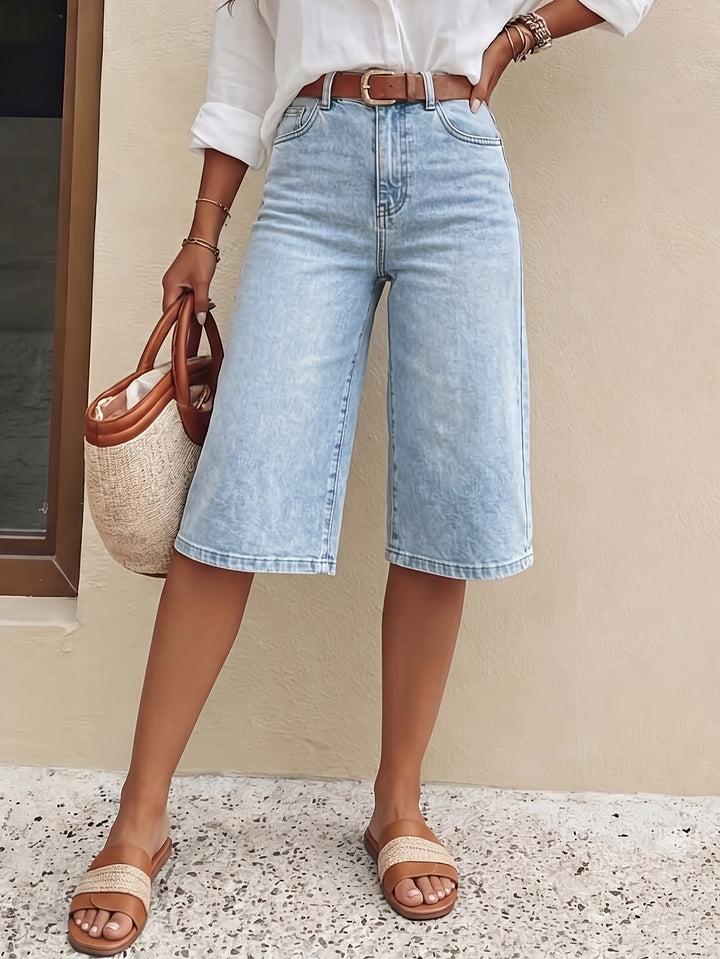 Light blue women's wide leg high waist shorts, a trendy and relaxed fit for summer casual wear.