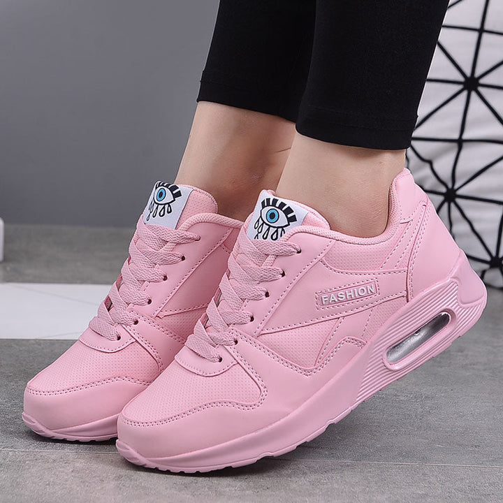 White chunky platform sneakers for women, trendy and comfortable for stylish walking.