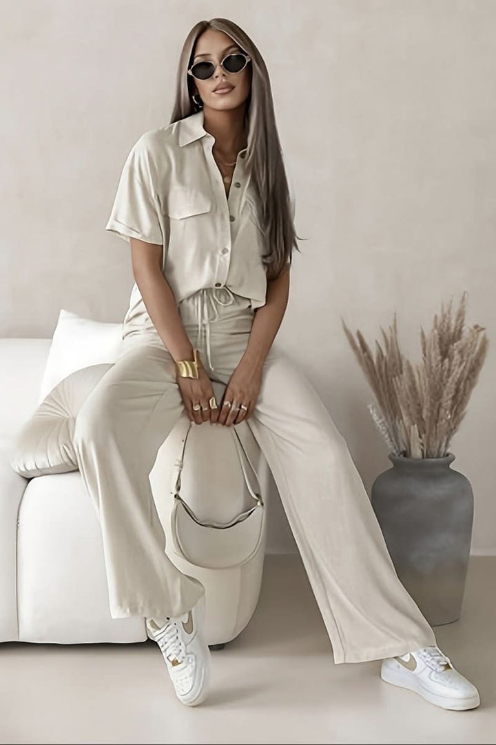 Light blue women's two-piece set, featuring minimalist design for chic casual wear, lounge, or spring workwear.