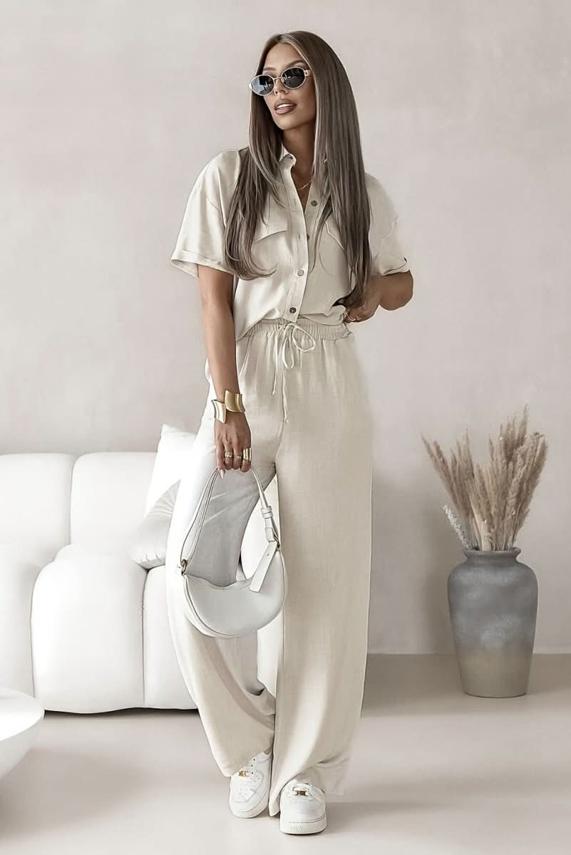 Chic white women's coordinated two-piece set, a versatile minimalist outfit for modern spring fashion and casual style.