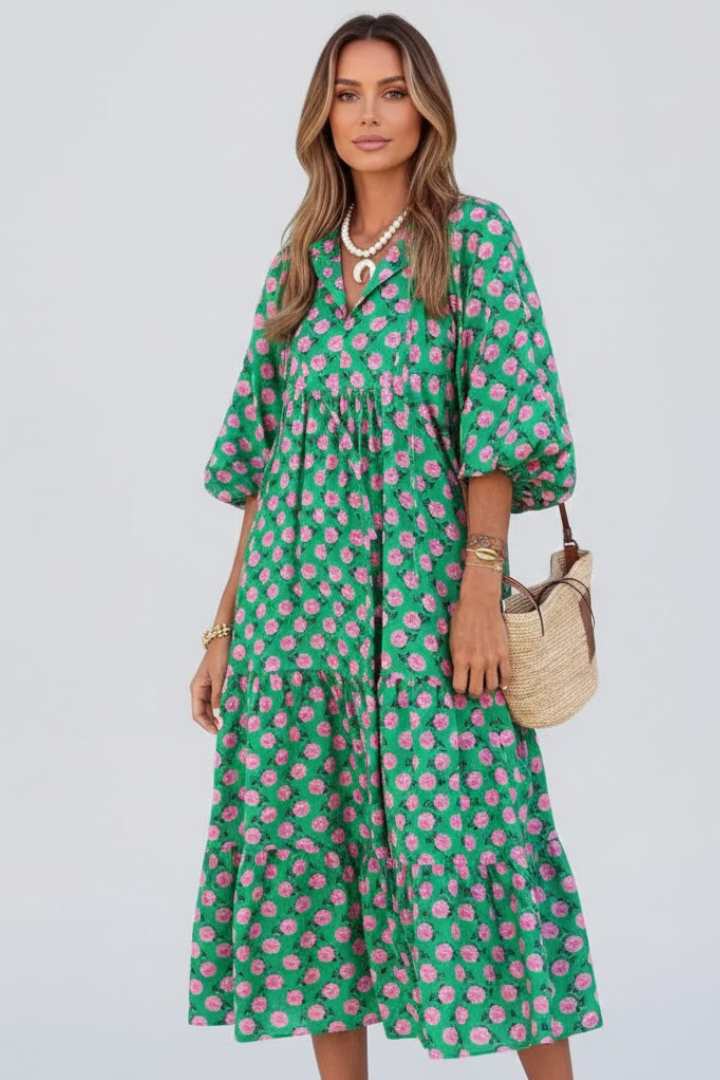 Comfortable women's V-neck short sleeve maxi dress, ideal for everyday summer fashion. Features a flowy green print.