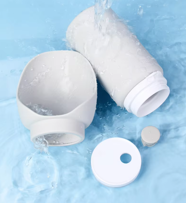 Grey pet water bottle and portable bowl combo, designed for easy pet hydration during travel.