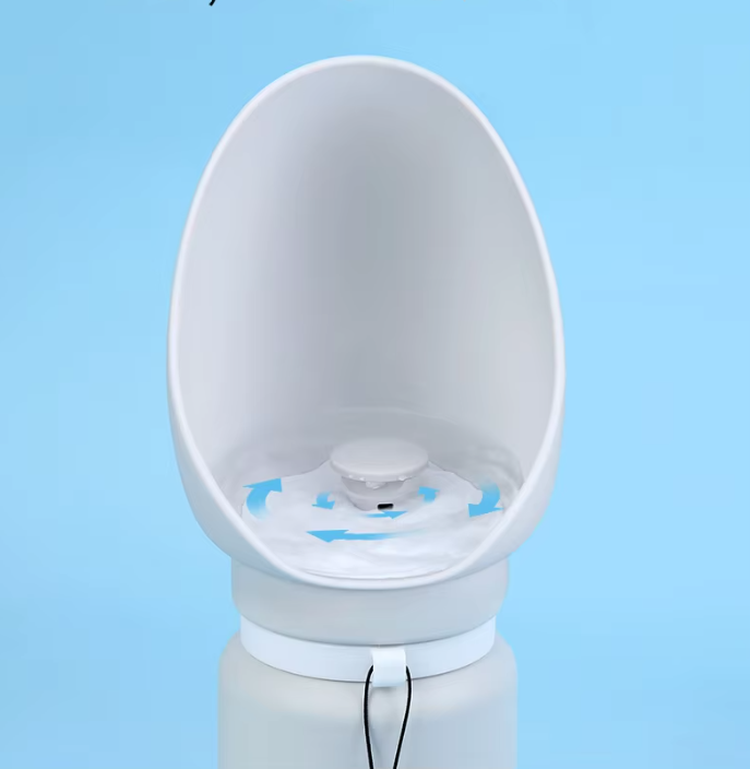 Compact pet hydration solution: travel water bottle with integrated foldable dish for dogs.