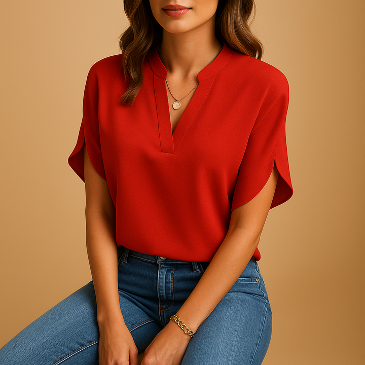 White women's elegant blouse. Lightweight & flowy, perfect versatile top for comfortable summer style.