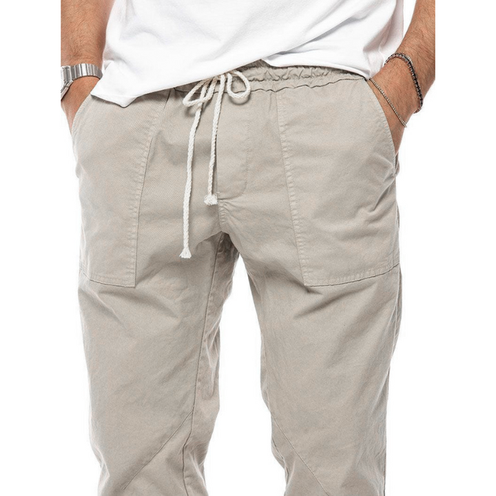 Easy-care lightweight men's joggers, 4-way stretch linen provides ultimate comfort & freedom of movement.