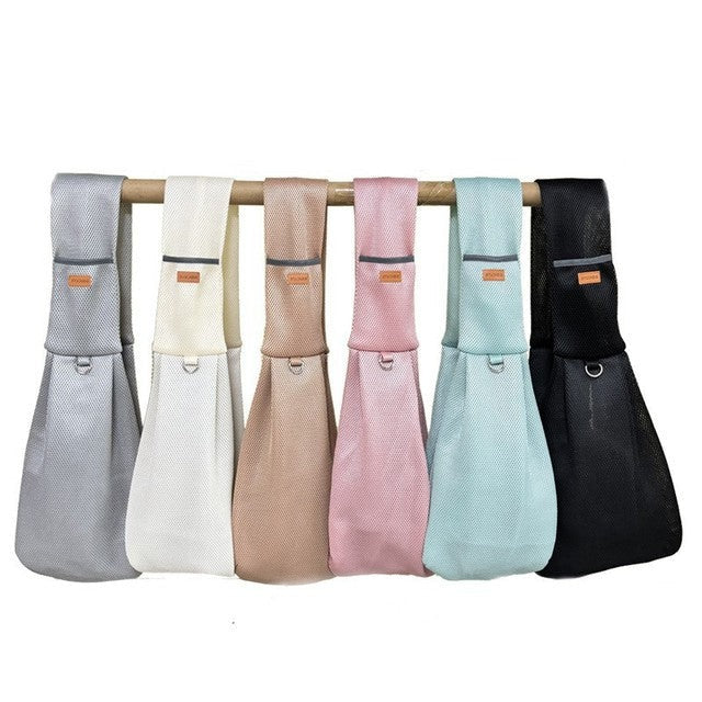 Stylish dog sling for small pets, crossbody design for convenience and pet safety