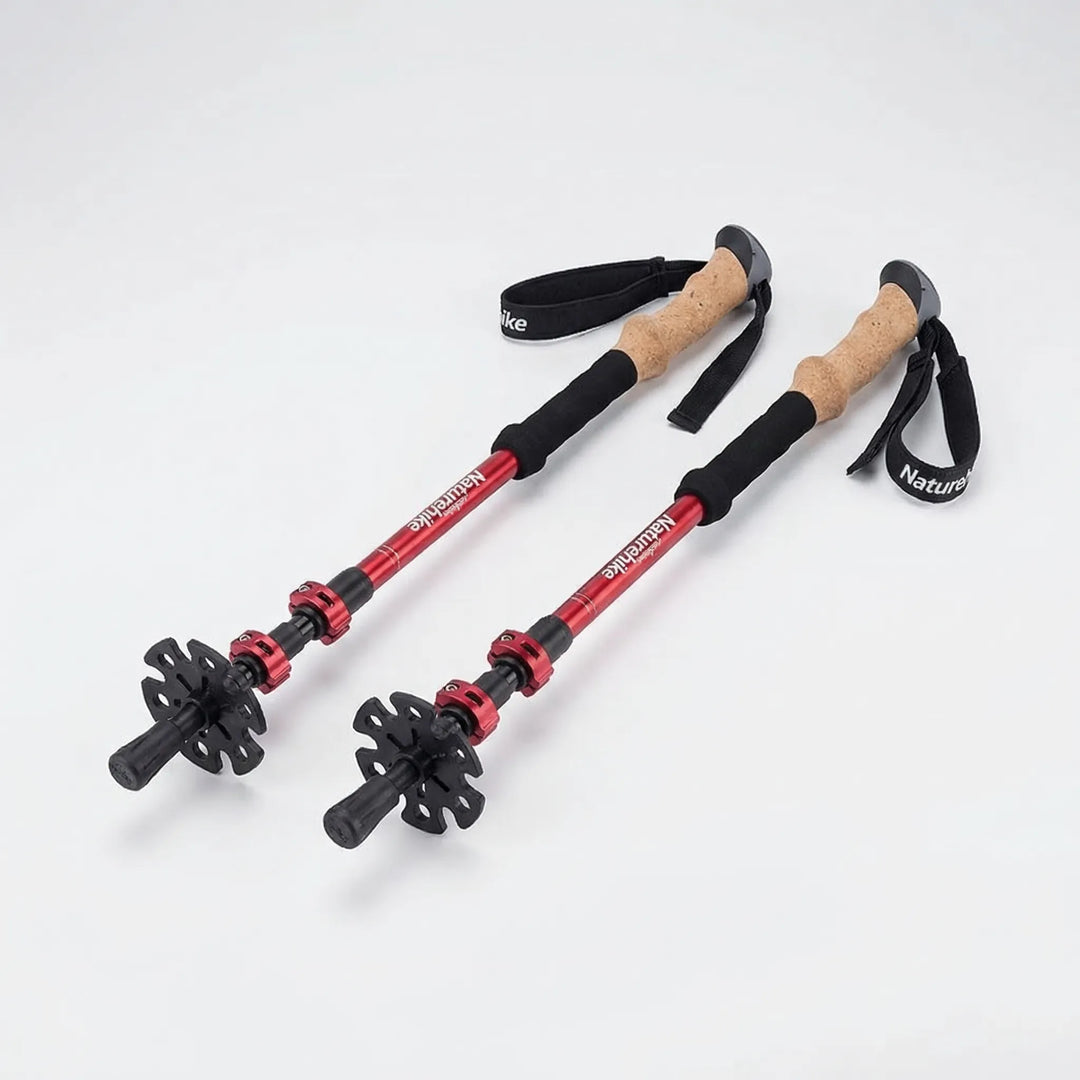 Full set of lightweight, carbon fiber hiking poles with accessories, essential outdoor gear for adventure.