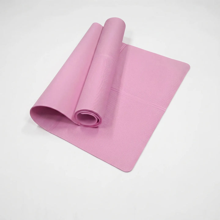 Unisex lightweight exercise mat supporting a yoga pose. Cushioned & non-slip for safe and effective fitness workouts.