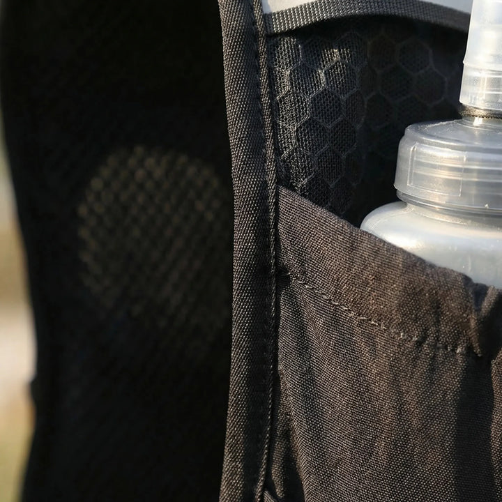 Unisex hydration pack for running, jogging, & outdoor sports; adjustable lightweight athletic gear.