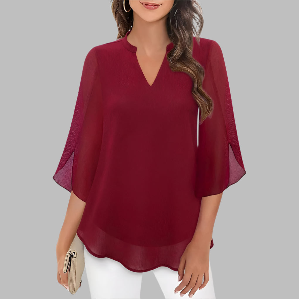 Casual women's lightweight V-neck top, perfect everyday summer blouse with charming petal sleeves for comfort.