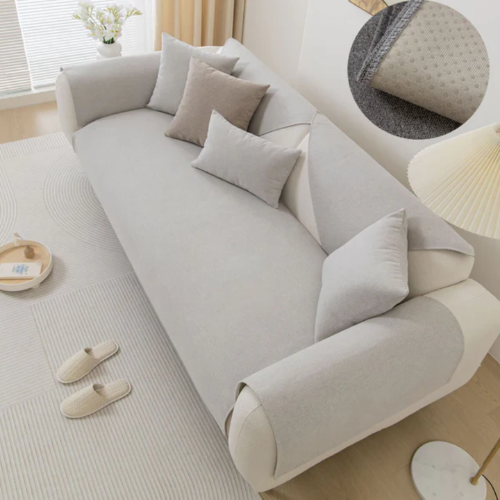 Close-up of durable linen blend fabric on a sectional couch cover with non-slip grip