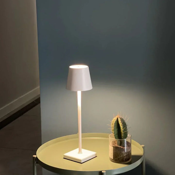 LumiAura portable LED patio light. Dimmable, wireless & rechargeable for perfect outdoor ambiance.