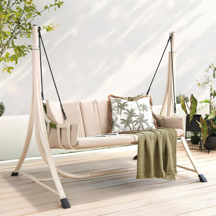 Modern beige outdoor patio swing bench with sturdy frame and canopy, designed for comfort and shade.