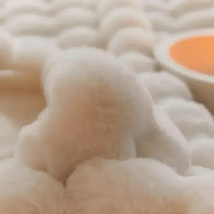 Portable faux fur blanket, offering luxurious softness and cozy warmth for all.