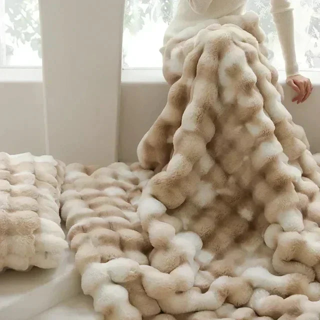 Softest faux fur throw blanket, ideal for snuggling on the couch or as bedding accent.