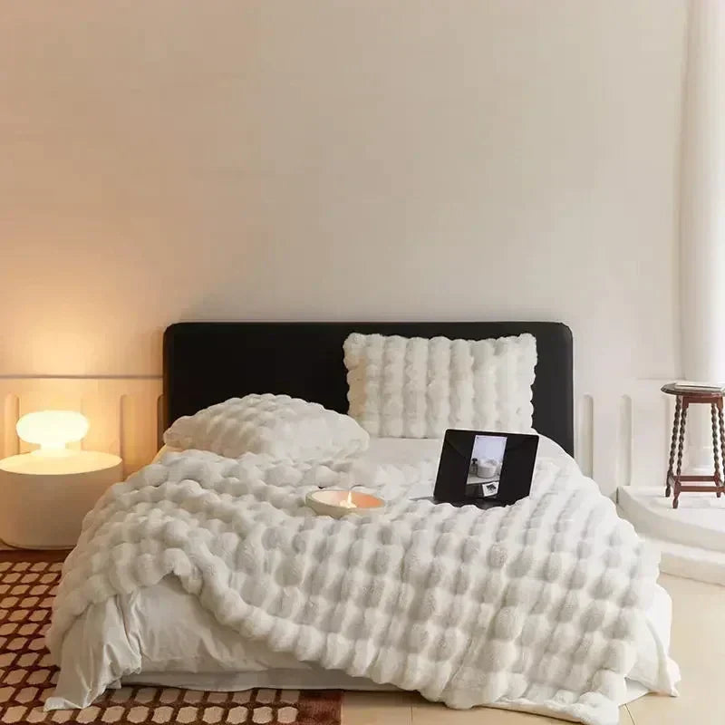Premium unisex faux fur throw, a portable, plush, and super soft cozy blanket.