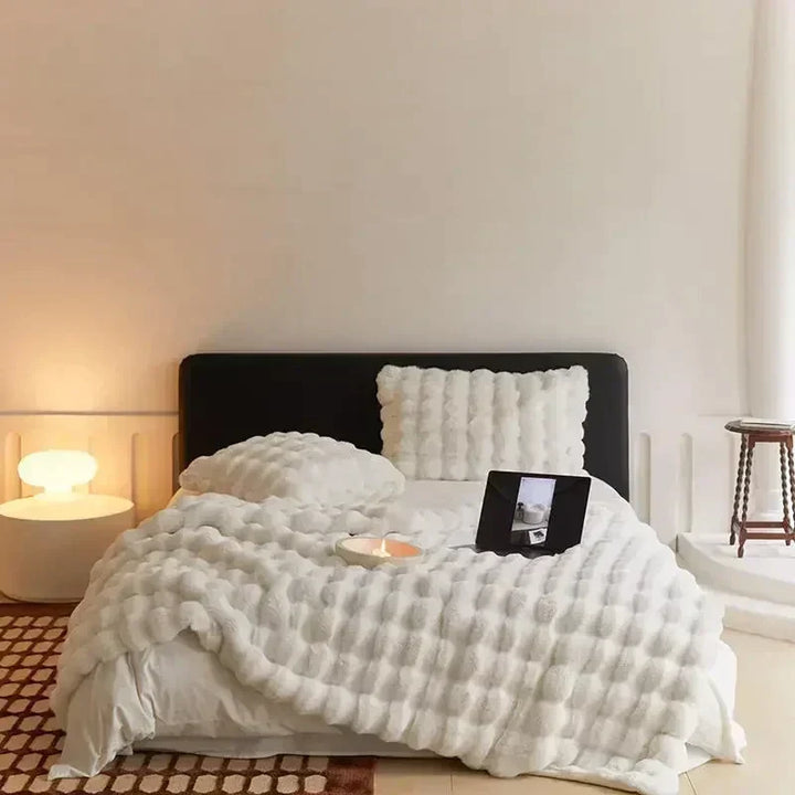 Premium unisex faux fur throw, a portable, plush, and super soft cozy blanket.