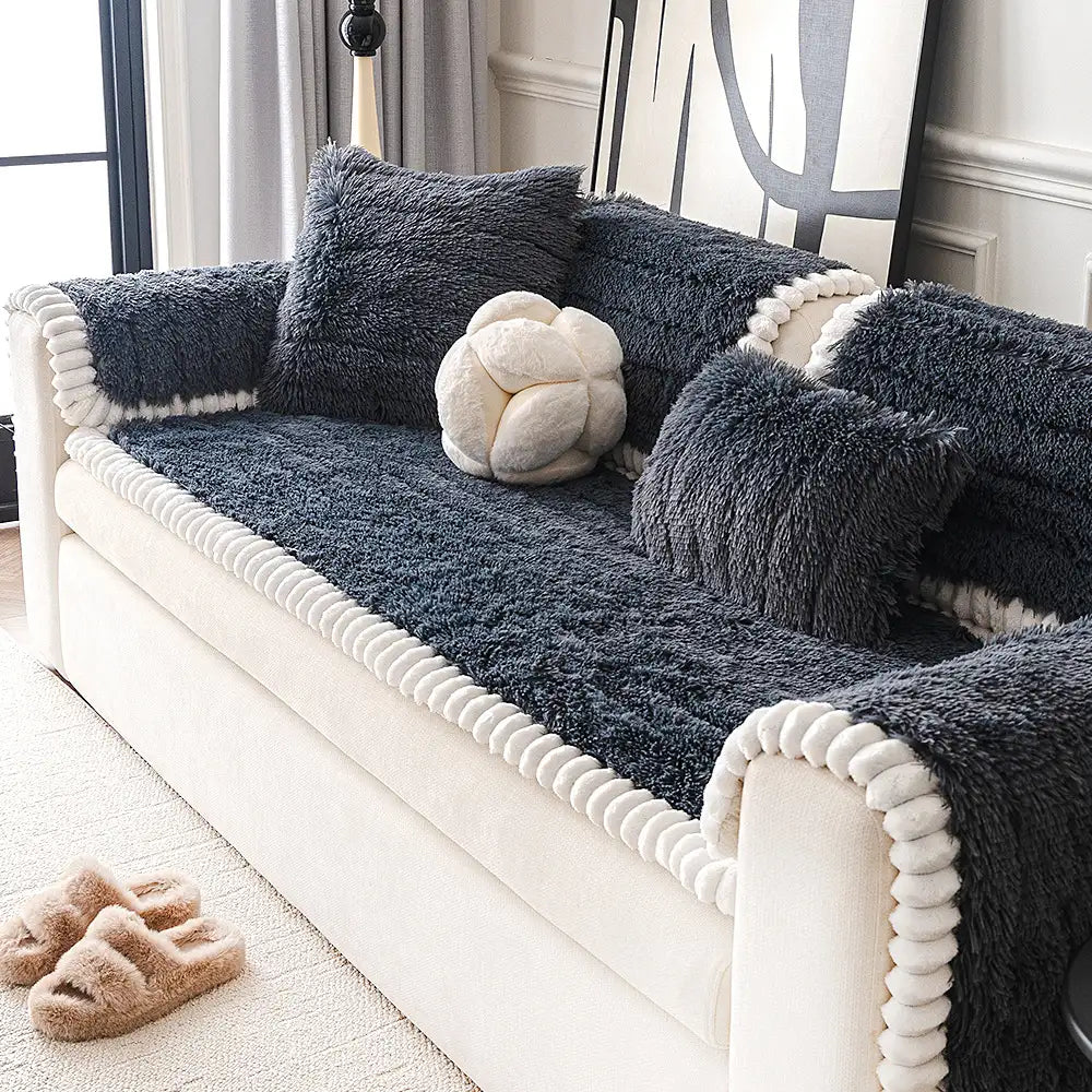 Soft sectional cover made from fluffy plush material, ensuring non-slip fit and furniture protection.