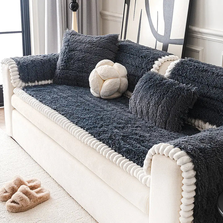 Soft sectional cover made from fluffy plush material, ensuring non-slip fit and furniture protection.