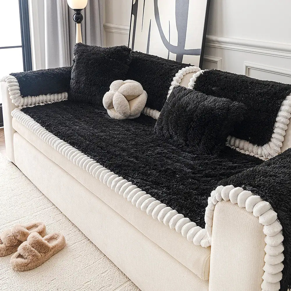 Elegant plush sofa cover with non-slip backing, perfect for safeguarding your couch from pets and spills.
