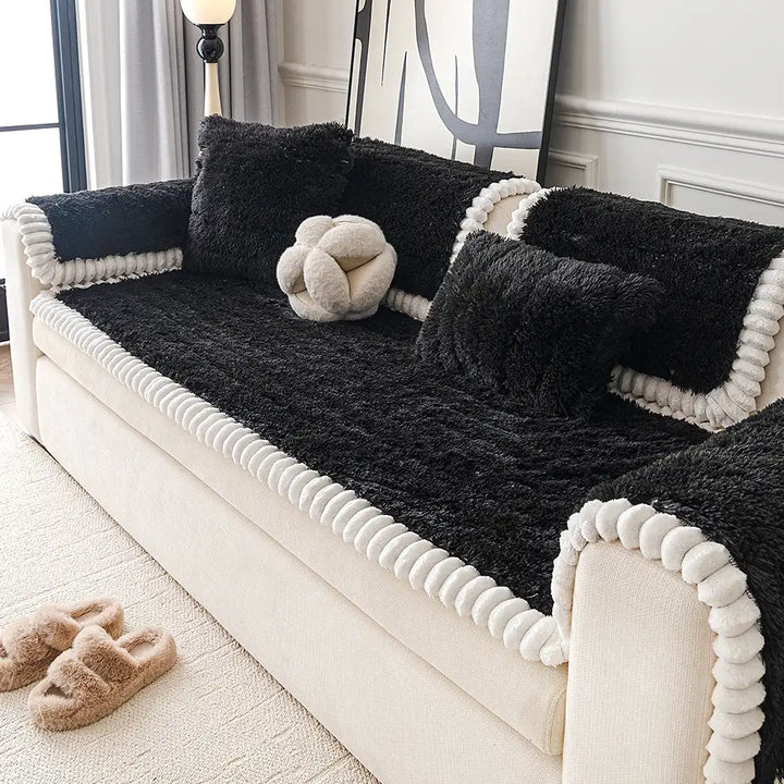 Elegant plush sofa cover with non-slip backing, perfect for safeguarding your couch from pets and spills.