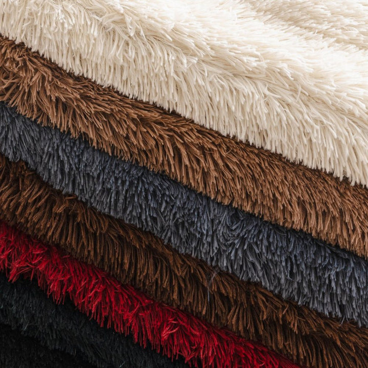 Fluffy plush sofa cover, offering luxurious pet-friendly protection for any couch or sectional.