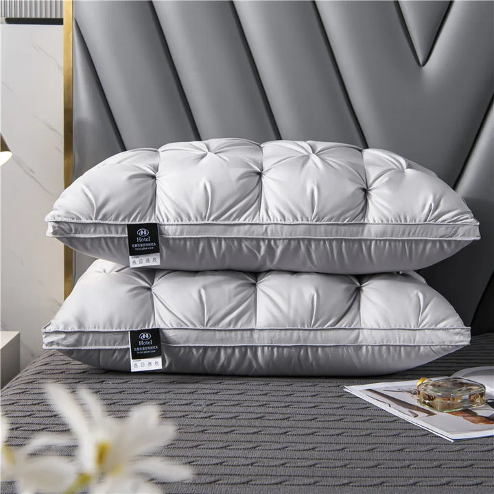 Plush white goose down bed pillow, premium luxury bedding for deep sleep comfort & neck support.